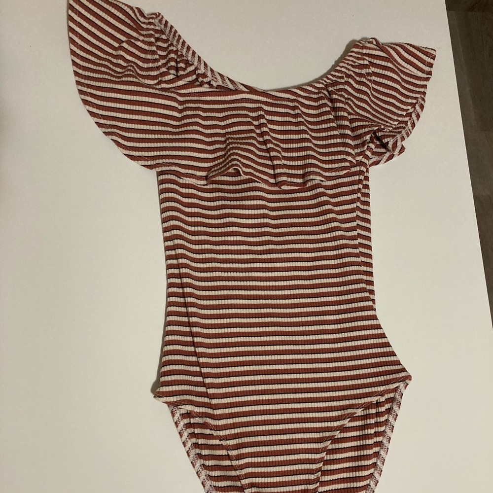 Kids medium but can work for a woman’a XS